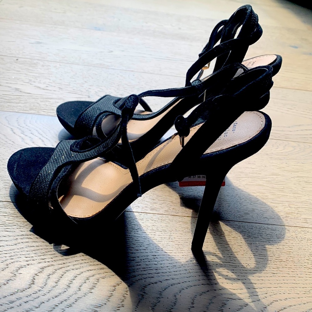 Black high heels with shiny details